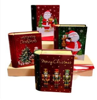 CAJA DE LATA 1 DECORATIVO MOD LIBRO NAVIDEÑO VARIADO 11.7*10*3.7CM